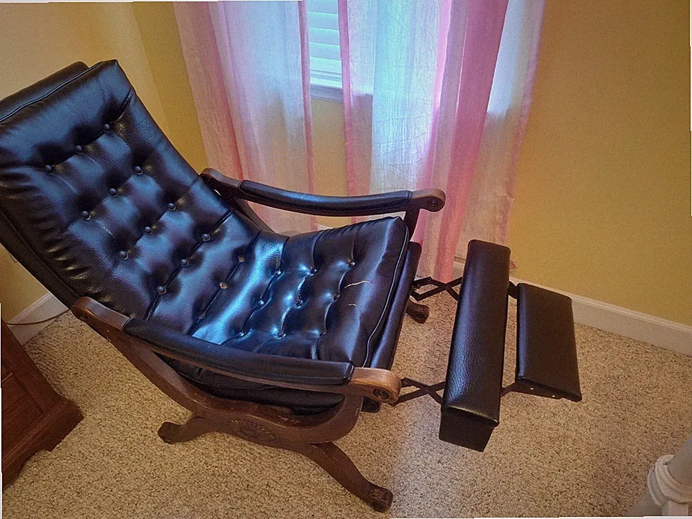 1950's vintage black leather recliner